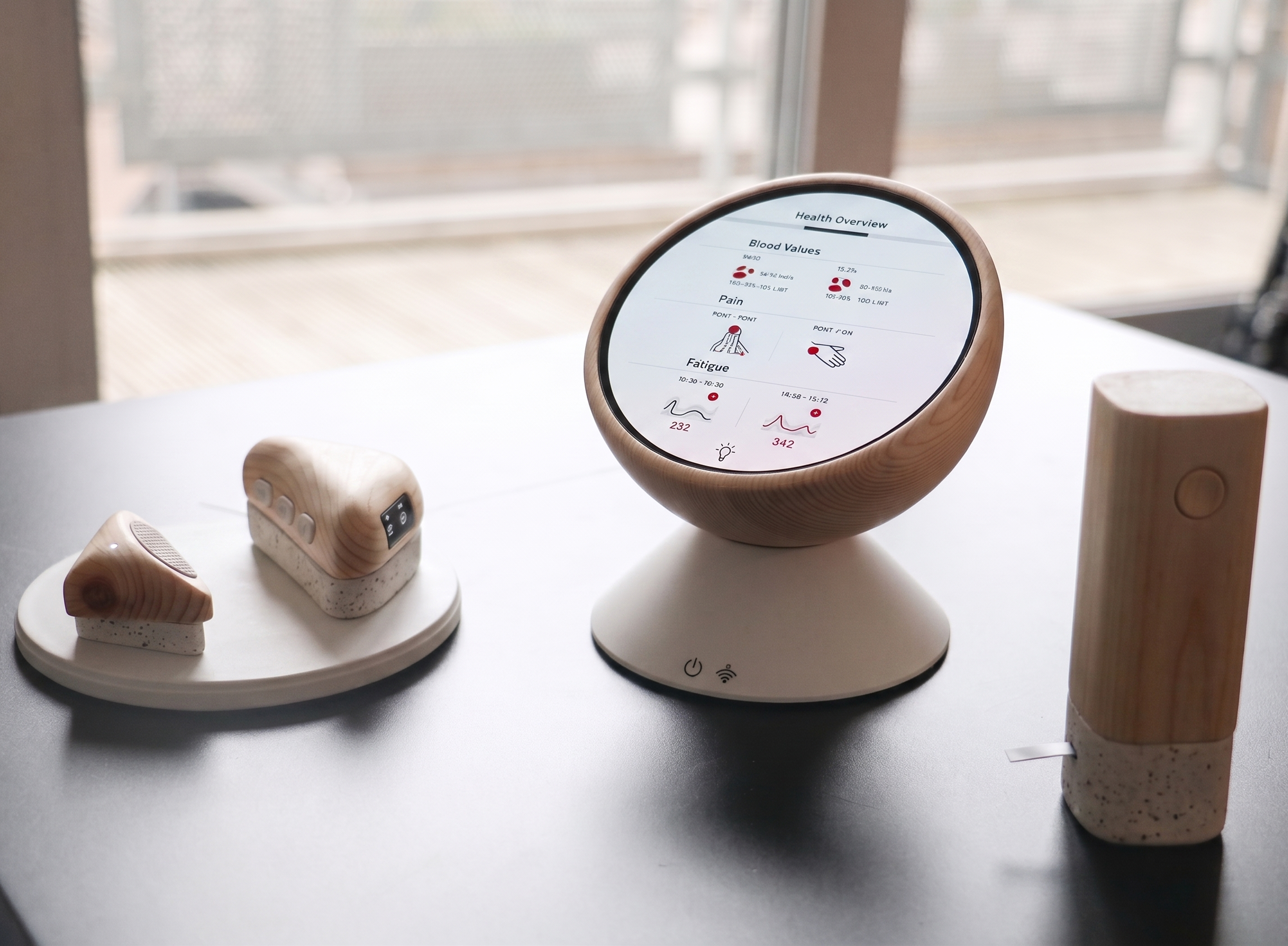 Final device set — wood and resin prototypes